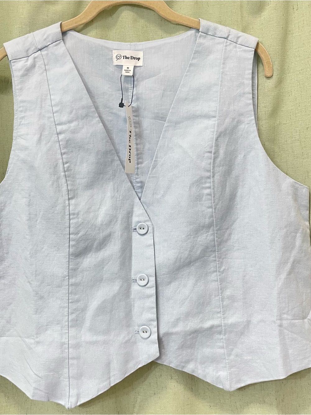 The Drop Women's Light Blue Sleeveless Button Front Bodysuit Vest